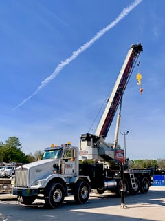 New National NBT60L boom truck being prepped by the CraneWorks Rentals team