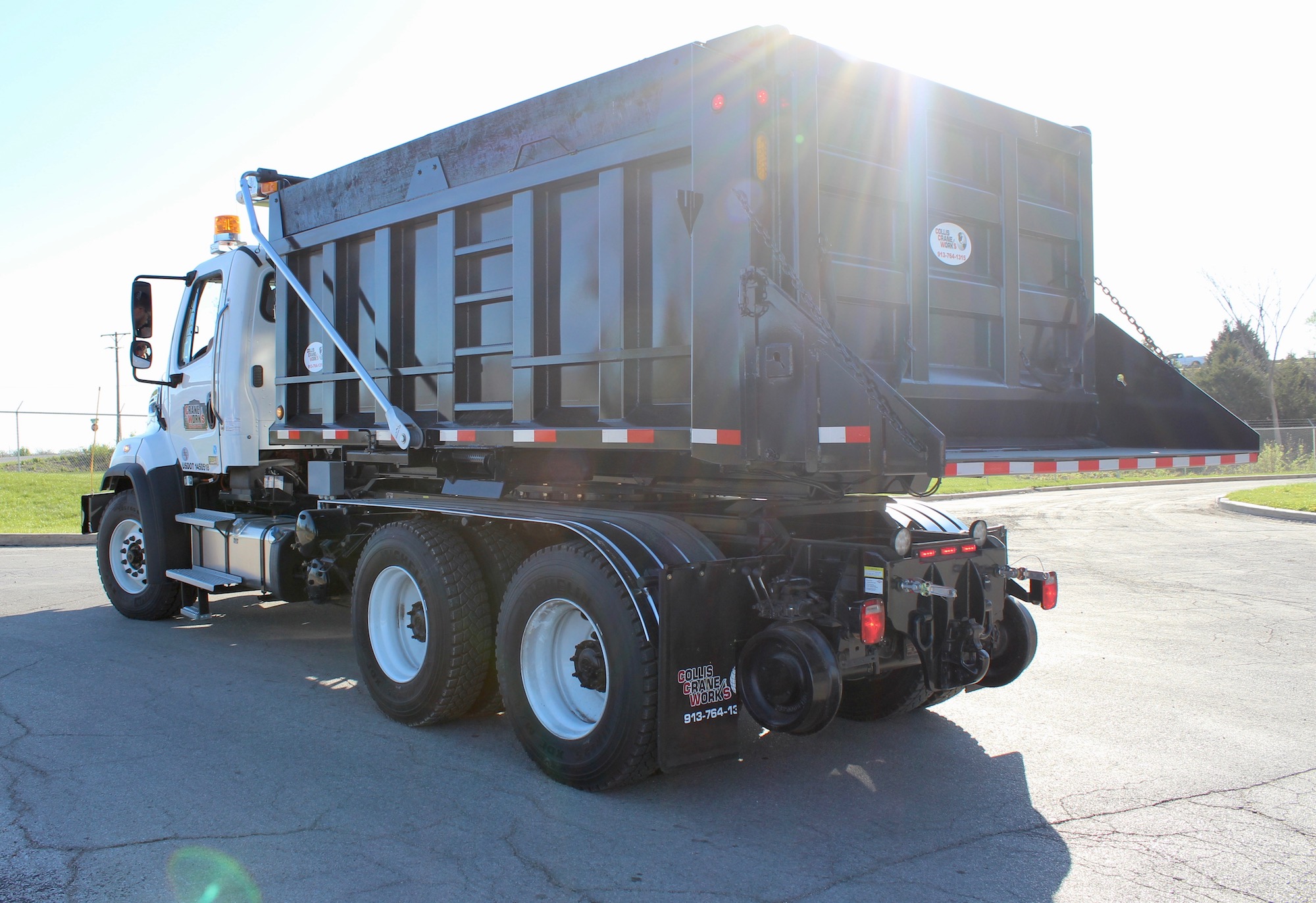 Rotary dump truck hi-rail equipment