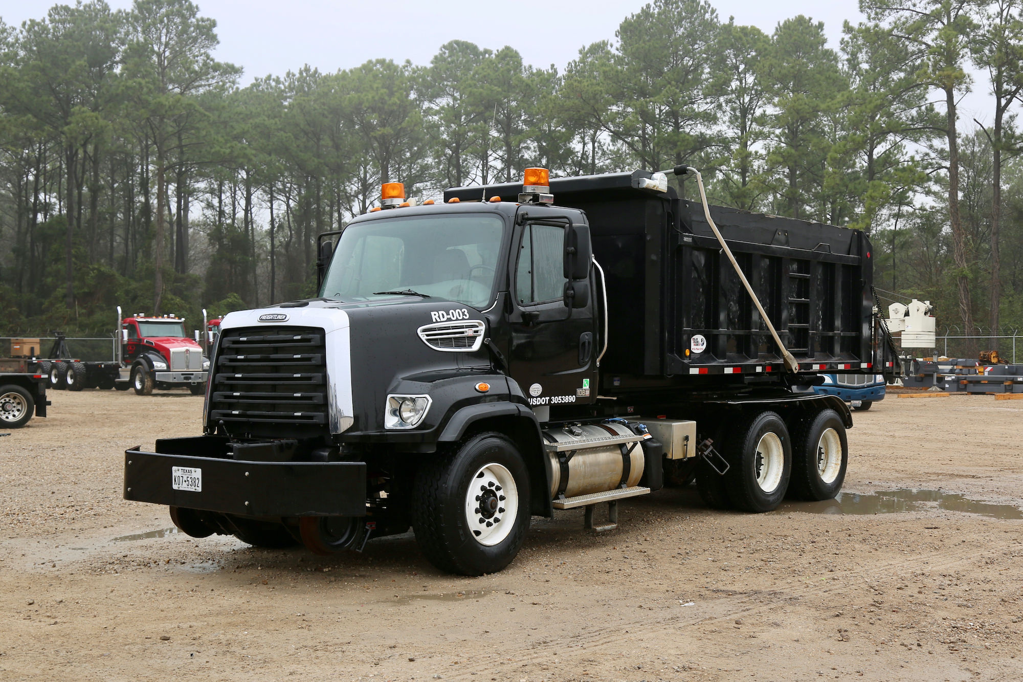 Freightliner hi rail truck with rotary dump body